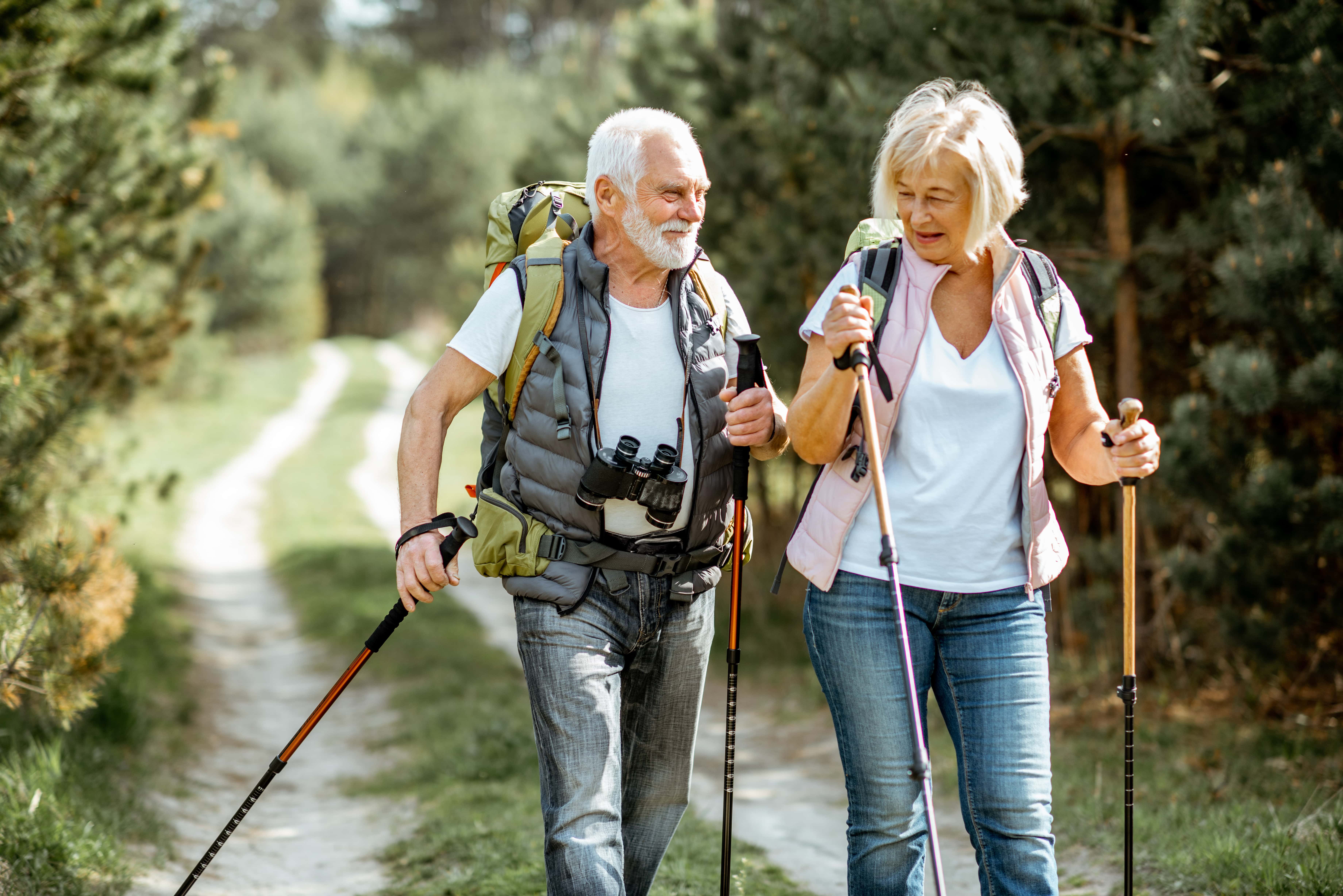 Seniors walking in park