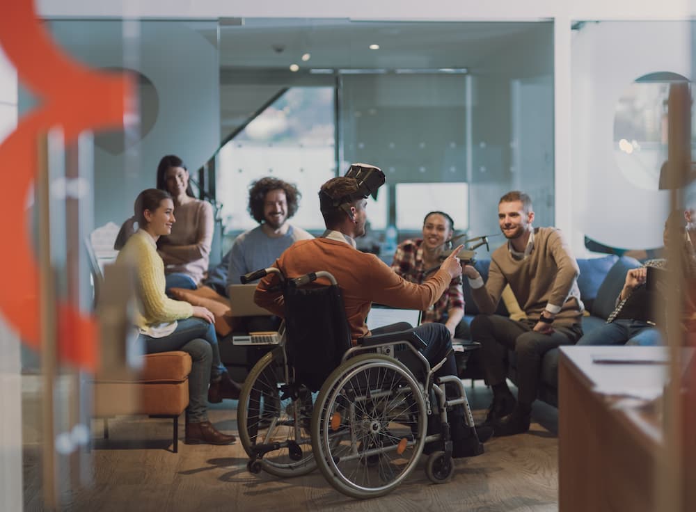Disabled man socializing with friends