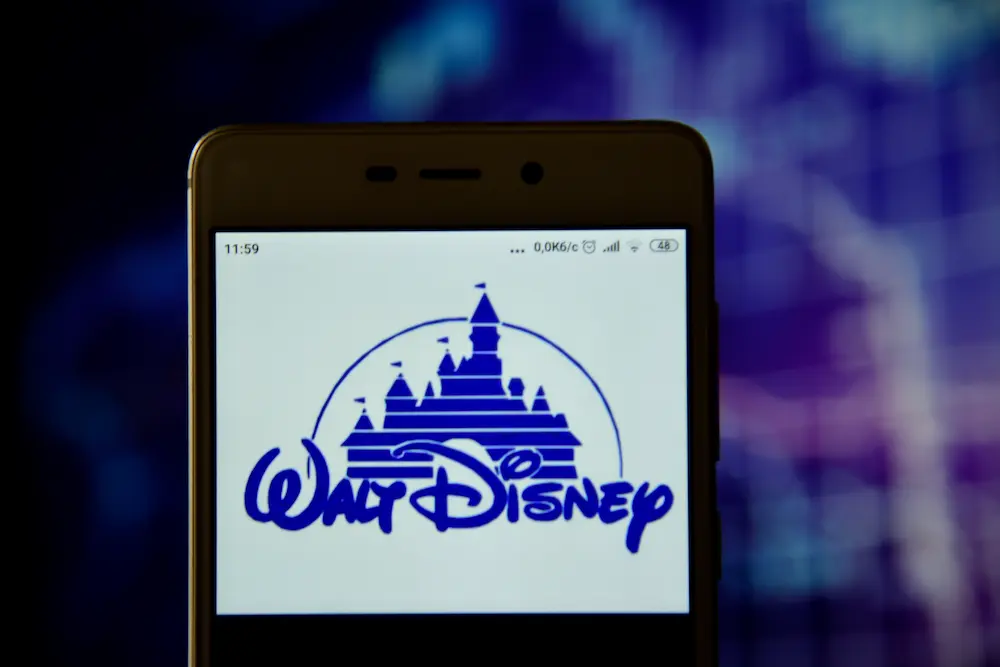 Walt Disney logo seen on the smartphone