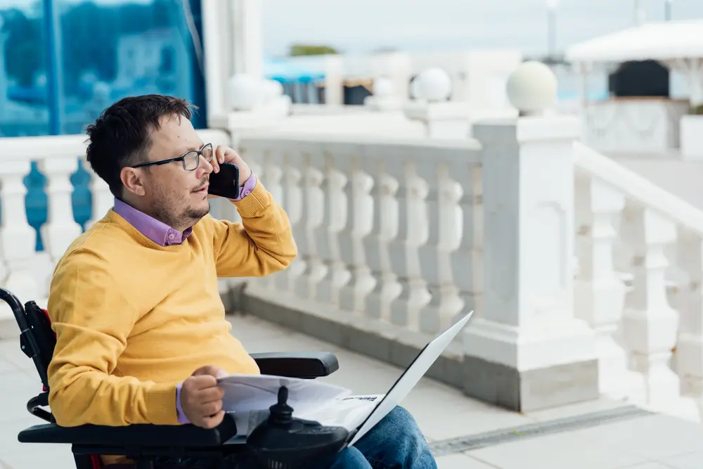 Man disabled with wheelchair work business online