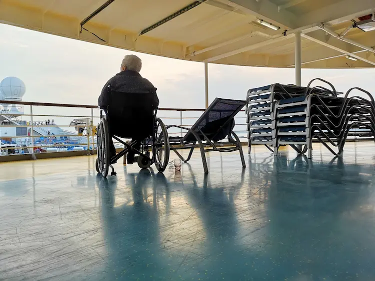 Senior in wheelchair on cruise ship